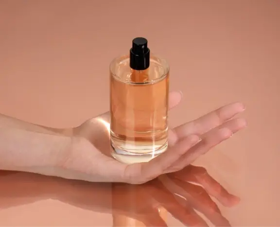 Fragrance Pump in a person's hand